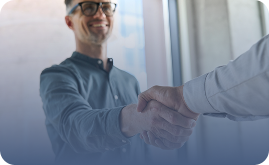 Business professionals handshake representing business insurance consultation services in California